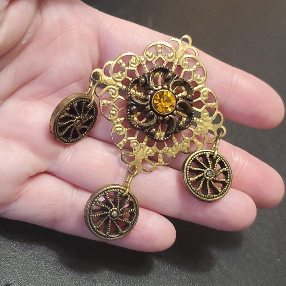 Gold tone vintage dangling brooch circles rhinestone